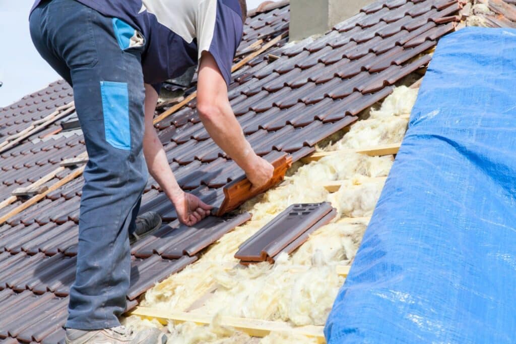 roofer installing tiles